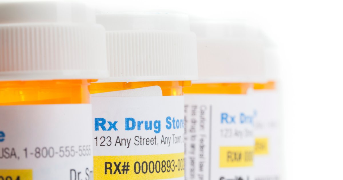 Prescription medication bottles with pharmacy labels representing Medicare Part D drug coverage